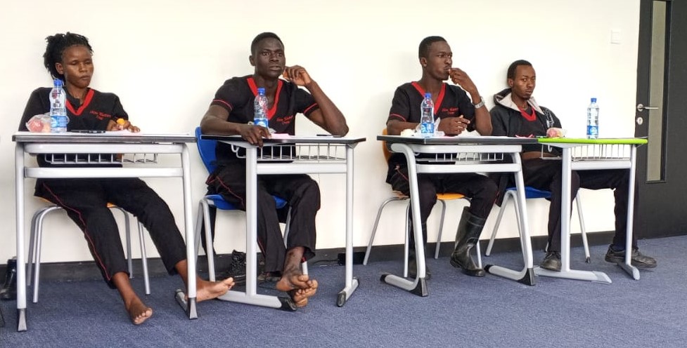 Shine Masters staff during a training session